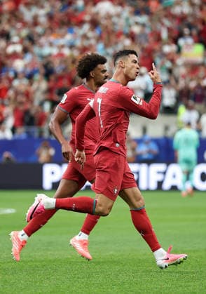 (260624) -- HOUSTON, June 24, 2026 -- Cristiano Ronaldo (R) of Portugal celebrates scoring during the group K match between Portugal and Uzbekistan at the 2026 FIFA World Cup, WM, Weltmeisterschaft, Fussball at Houston Stadium in Houston, the United States, June 23, 2026. ) (SP)U.S.-HOUSTON-FOOTBALL-FIFA WORLD CUP-GROUP K-POR VS UZB LixMing 