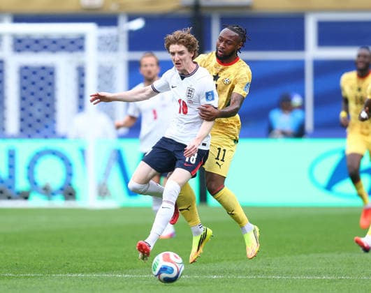 Foxborough, USA, 23rd June 2026. Anthony Gordon of England tackled by Antoine Semenyo of Ghana during the England vs Ghana FIFA World Cup, WM, Weltmeisterschaft, Fussball match at Gillette Stadium, Foxborough. Picture credit should read: Paul Terry Sportimage EDITORIAL USE ONLY. No use with unauthorised audio, video, data, fixture lists, club league logos or live services. Online in-match use limited to 120 images, no video emulation. No use in betting, games or single club league player publications. SPI_047_PT_Eng_Ghana SPI-4840-0049