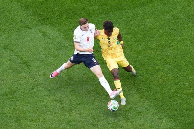 Elliot Anderson of England and Caleb Yirenkyi of Ghana England v Ghana, 2026 FIFA World Cup, WM, Weltmeisterschaft, Fussball Group L, Football, Boston Stadium, Foxborough, Massachusetts, USA - 23 Jun 2026Foxborough Boston Stadium Massachusetts (MA) United States of America EDITORIAL USE ONLY No use with unauthorised audio, video, data, fixture lists, club league logos or live services. Online in-match use limited to 120 images, no video emulation. No use in betting, games or single club league player publications.  Copyright: xIsmaelxAdnan Shutterstockx 16956027bj