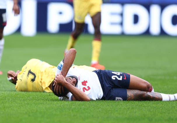 Foxborough, USA, 23rd June 2026. James Reece of England goes down with a head injury during the England vs Ghana FIFA World Cup, WM, Weltmeisterschaft, Fussball match at Gillette Stadium, Foxborough. Picture credit should read: Paul Terry Sportimage EDITORIAL USE ONLY. No use with unauthorised audio, video, data, fixture lists, club league logos or live services. Online in-match use limited to 120 images, no video emulation. No use in betting, games or single club league player publications. SPI_054_PT_Eng_Ghana SPI-4840-0054
