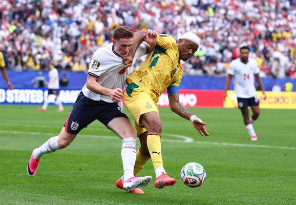 Foxborough, USA, 23rd June 2026. Elliot Anderson of England tackles Jordan Ayew of Ghana during the England vs Ghana FIFA World Cup, WM, Weltmeisterschaft, Fussball match at Gillette Stadium, Foxborough. Picture credit should read: Paul Terry Sportimage EDITORIAL USE ONLY. No use with unauthorised audio, video, data, fixture lists, club league logos or live services. Online in-match use limited to 120 images, no video emulation. No use in betting, games or single club league player publications. SPI_084_PT_Eng_Ghana SPI-4840-0092