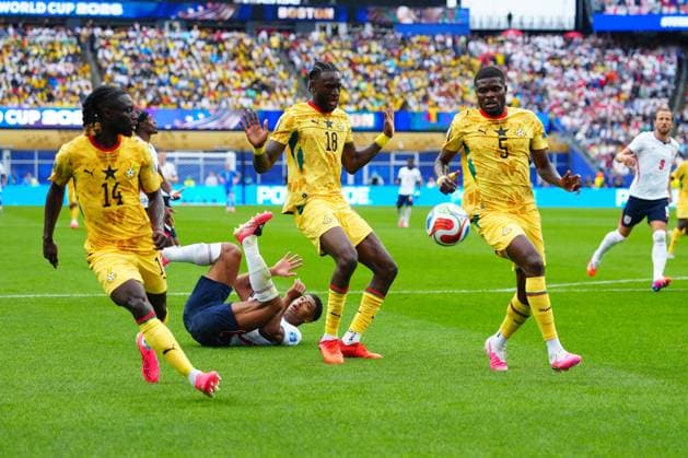 Jude Bellingham of England loses the ball to three Ghana players England v Ghana, 2026 FIFA World Cup, WM, Weltmeisterschaft, Fussball Group L, Football, Boston Stadium, Foxborough, Massachusetts, USA - 23 Jun 2026Foxborough Boston Stadium Massachusetts (MA) United States of America EDITORIAL USE ONLY No use with unauthorised audio, video, data, fixture lists, club league logos or live services. Online in-match use limited to 120 images, no video emulation. No use in betting, games or single club league player publications.  Copyright: xJavierxGarcia Shutterstockx 16956021cs