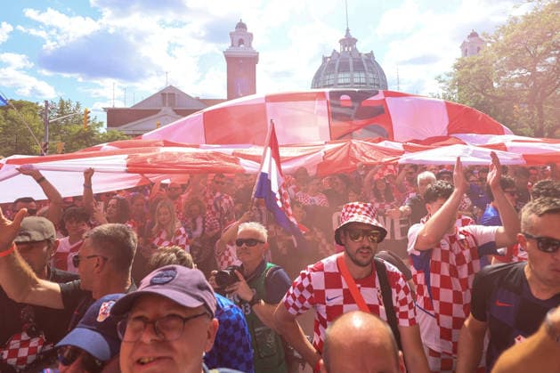 Toronto Croatia Flag Parade Thousands of Croatian fans pack Main Street as they carry a large Croatian flag during a Croatian parade before the FIFA World Cup, WM, Weltmeisterschaft, Fussball 2026 Group L match between Panama and Croatia on June 23, 2026 in Toronto, Ontario.  SanjinxStrukic PIXSELL