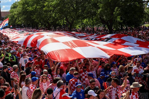 Toronto Croatia Flag Parade Thousands of Croatian fans pack Main Street as they carry a large Croatian flag during a Croatian parade before the FIFA World Cup, WM, Weltmeisterschaft, Fussball 2026 Group L match between Panama and Croatia on June 23, 2026 in Toronto, Ontario.  SanjinxStrukic PIXSELL