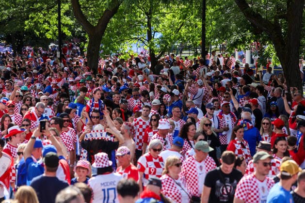 Toronto Croatia Flag Parade Thousands of Croatian fans pack Main Street as they carry a large Croatian flag during a Croatian parade before the FIFA World Cup, WM, Weltmeisterschaft, Fussball 2026 Group L match between Panama and Croatia on June 23, 2026 in Toronto, Ontario.  SanjinxStrukic PIXSELL