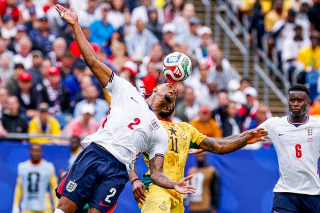 Ezri Konsa of England and Antoine Semenyo of Ghana battle for the ball , Group L - FIFA World Cup, WM, Weltmeisterschaft, Fussball 2026, England v Ghana, Boston Stadium, June 23, 2026, Boston, United States.