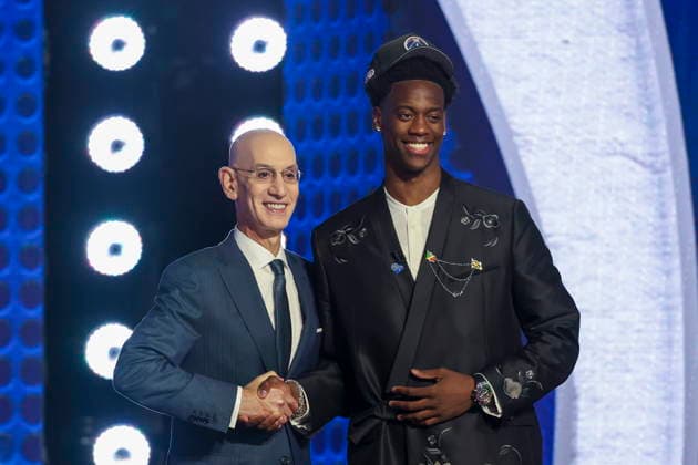 NBA, Basketball Herren, USA Draft round one at Barclays Center NBA commissioner Adam Silver (L) and American basketball player AJ Dybantsa pose for a picture after he was drafted by the Washington Wizards during the first round of the 2026 NBA Draft at the Barclays Center in the Brooklyn borough of New York, New York, USA, 23 June 2026. NEW YORK NEW YORK United States  Copyright: xSARAHxYENESELx