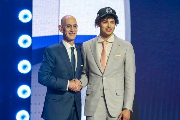 NBA, Basketball Herren, USA Draft round one at Barclays Center NBA commissioner Adam Silver (L) and American basketball player Keaton Wagler pose for a picture after he was drafted by the LA Clippers during the first round of the 2026 NBA Draft at the Barclays Center in the Brooklyn borough of New York, New York, USA, 23 June 2026. NEW YORK NEW YORK United States  Copyright: xSARAHxYENESELx