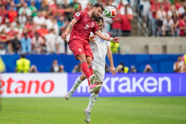 June 23, 2026: Portugal midfielder Bruno Fernandes (8) heads the ball in front of Uzbekistan defender Abdulla Abdullaev (18) during a FIFA World Cup, WM, Weltmeisterschaft, Fussball Group K match between Portugal and Uzbekistan in Houston, TX. .. CSM - ZUMAc04_ 20260623_zma_c04_141 Copyright: xTraskxSmithx