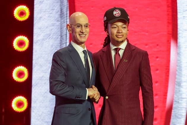 NBA, Basketball Herren, USA Draft round one at Barclays Center NBA commissioner Adam Silver (L) and American basketball player Kingston Flemings pose for a picture after he was drafted by the Atlanta Falcons during the first round of the 2026 NBA Draft at the Barclays Center in the Brooklyn borough of New York, New York, USA, 23 June 2026. NEW YORK NEW YORK United States  Copyright: xSARAHxYENESELx