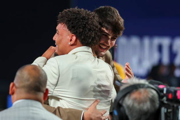 NBA, Basketball Herren, USA Draft round one at Barclays Center Basketball players Yaxel Lendeborg (front) and Aday Mara (back) react to Lendeborg to being drafted by the Golden State Warriors during the first round of the 2026 NBA Draft at the Barclays Center in the Brooklyn borough of New York, New York, USA, 23 June 2026. NEW YORK NEW YORK United States  Copyright: xSARAHxYENESELx