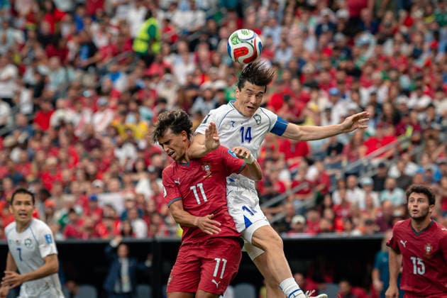 June 23, 2026: Uzbekistan forward ELDOR SHOMURODOV (14) heads the ball during the FIFA World Cup, WM, Weltmeisterschaft, Fussball 2026 Group K soccer game between Portugal and Uzbekistan at the Houston Stadium in Houston, TX, Tuesday, June 23, 2026. Portugal wins 5:0. World Cup 2026: Portugal Vs Uzbekistan  - ZUMAp213 20260623_znp_p213_072 Copyright: xLynnxPenningtonx