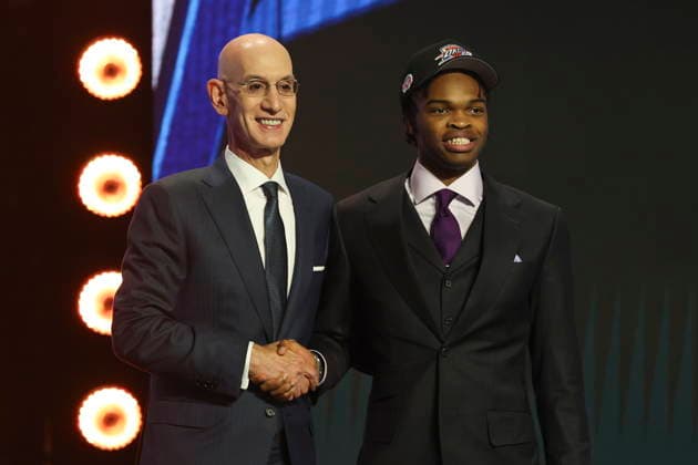 NBA, Basketball Herren, USA Draft round one at Barclays Center NBA commissioner Adam Silver (L) and American basketball player Ebuka Okorie pose for a picture after he was drafted by the Oklahoma City Thunder during the first round of the 2026 NBA Draft at the Barclays Center in the Brooklyn borough of New York, New York, USA, 23 June 2026. NEW YORK NEW YORK United States  Copyright: xSARAHxYENESELx