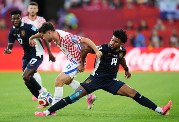 June 23, 2026, Toronto, On, CANADA: Croatia s Martin Baturina (16) battles for the ball with Panama s Carlos Harvey (14) during the second half of a World Cup Group L soccer match, in Toronto, on Tuesday, June 23, 2026. Canada News - June 23, 2026  - ZUMAc35_ 20260623_zaf_c35_218 Copyright: xNathanxDenettex