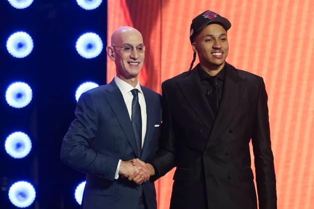 NBA, Basketball Herren, USA Draft round one at Barclays Center NBA commissioner Adam Silver (L) and American basketball player Cameron Carr pose for a picture after he was drafted by the New York Knicks during the first round of the 2026 NBA Draft at the Barclays Center in the Brooklyn borough of New York, New York, USA, 23 June 2026. NEW YORK NEW YORK United States  Copyright: xSARAHxYENESELx