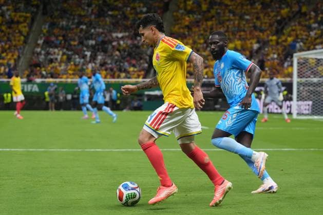 Colombia v DR Congo - FIFA World Cup, WM, Weltmeisterschaft, Fussball 2026 - Group K ZAPOPAN, MEXICO - JUNE 23: Gustavo Puerta of Colombia in action against Arthur Masuaku (26) of DR Congo during the 2026 FIFA World Cup First Stage Group K match between Colombia and DR Congo at Estadio Akron (Guadalajara Stadium) in Zapopan, Guadalajara, Mexico on June 23, 2026. Juancho Torres Anadolu Jalisco Mexico. Editorial use only. Please get in touch for any other usage.  Copyright: x2026xAnadoluxJuanchoxTorresx