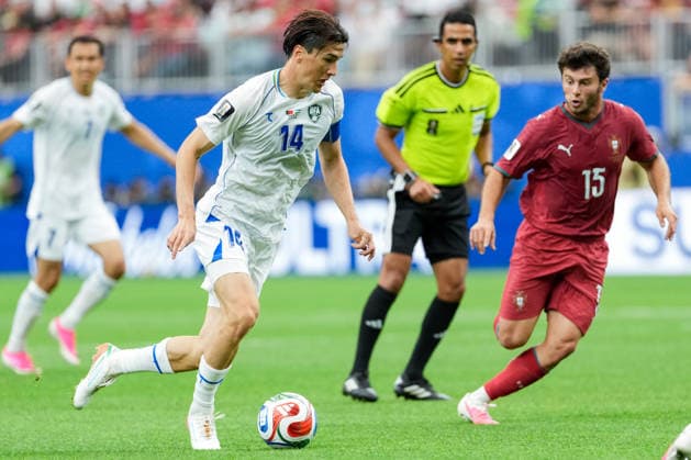 Eldor Shomurodov of Uzbekistan runs with the ball during a FIFA Men’s World Cup 2026 Group Stage football match between Portugal and Uzbekistan at Houston Stadium, in Houston on June 23th 2026 (Photo by LVDIDI SPP)  Copyright: xLVDIDI SPPx Sportspressphoto_SPR174412