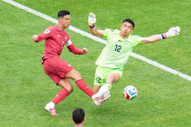 Cristiano Ronaldo of Portugal (R) shoots for goal under pressure from Abduvohid Nematov of Uzbekistan (R) during a FIFA Men’s World Cup 2026 Group Stage football match between Portugal and Uzbekistan at Houston Stadium, in Houston on June 23th 2026 (Photo by Alexandra Fechete SPP)  Copyright: xAlexandraxFechete SPPx Sportspressphoto_SPR174401