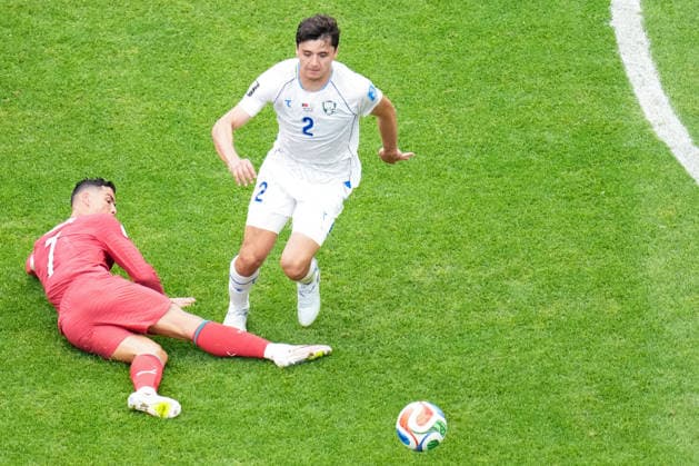 Cristiano Ronaldo of Portugal (L) and Abdukodir Khusanov of Uzbekistan (R) fight for possession during a FIFA Men’s World Cup 2026 Group Stage football match between Portugal and Uzbekistan at Houston Stadium, in Houston on June 23th 2026 (Photo by Alexandra Fechete SPP)  Copyright: xAlexandraxFechete SPPx Sportspressphoto_SPR174496