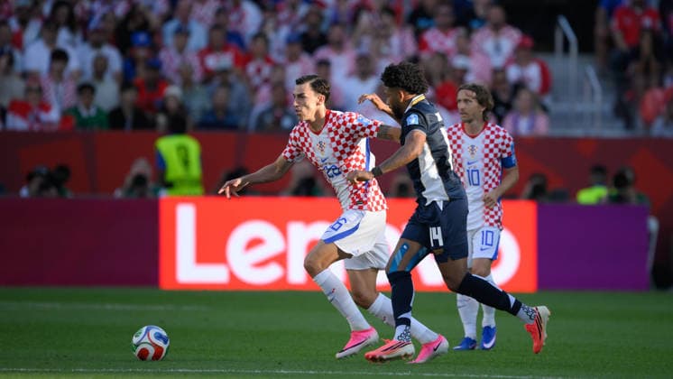 June 23, 2026, Toronto, Ontario, Canada: Martin Erlic ( 26) of Croatia moves the ball as he is pursued by Carlos Harvey ( 14) of Panama during the 2026 FIFA World Cup, WM, Weltmeisterschaft, Fussball game between Panama and Croatia at Toronto Stadium. Croatia won the match 1-0. Sports News - June 23, 2026  - ZUMAv136 20260623_zsp_v136_035 Copyright: xJeffxVoganx
