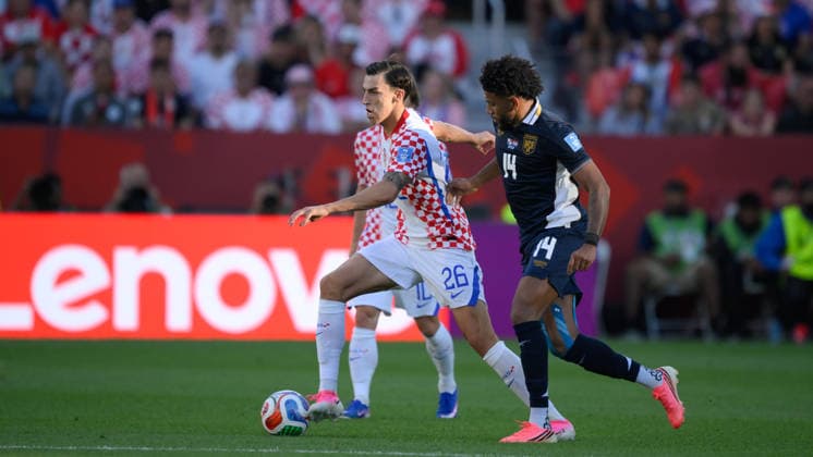 June 23, 2026, Toronto, Ontario, Canada: Martin Erlic ( 26) of Croatia moves the ball as he is pursued by Carlos Harvey ( 14) of Panama during the 2026 FIFA World Cup, WM, Weltmeisterschaft, Fussball game between Panama and Croatia at Toronto Stadium. Croatia won the match 1-0. Sports News - June 23, 2026  - ZUMAv136 20260623_zsp_v136_044 Copyright: xJeffxVoganx