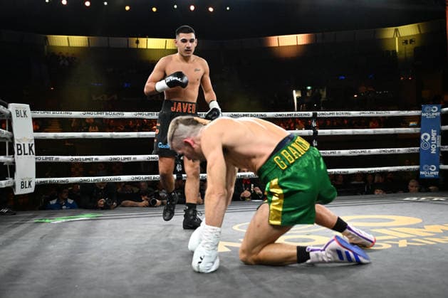 BOXING PARO CROCKER, Jack Javed (left) knocks down Lance MacDonald (right) during their Super welterweight fight at Pat Rafter Arena in Brisbane, Wednesday, June 24, 2026. ( NO ARCHIVING, EDITORIAL USE ONLY BRISBANE QUEENSLAND AUSTRALIA  Copyright: xDARRENxENGLANDx 20260624174165751876