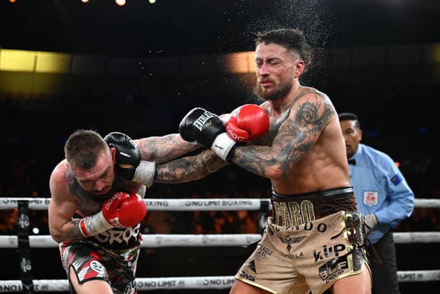 BOXING PARO CROCKER, Lewis Crocker (left) of Northern Ireland in action against Liam Paro (right) of Australia during the IBF Welterweight World Title fight at Pat Rafter Arena in Brisbane, Wednesday, June 24, 2026. ( NO ARCHIVING, EDITORIAL USE ONLY BRISBANE QUEENSLAND AUSTRALIA  Copyright: xDARRENxENGLANDx 20260624141025446658