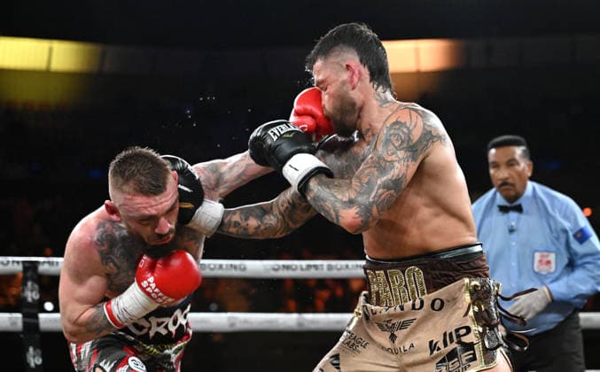 BOXING PARO CROCKER, Lewis Crocker (left) of Northern Ireland in action against Liam Paro (right) of Australia during the IBF Welterweight World Title fight at Pat Rafter Arena in Brisbane, Wednesday, June 24, 2026. ( NO ARCHIVING, EDITORIAL USE ONLY BRISBANE QUEENSLAND AUSTRALIA  Copyright: xDARRENxENGLANDx 20260624185288497212