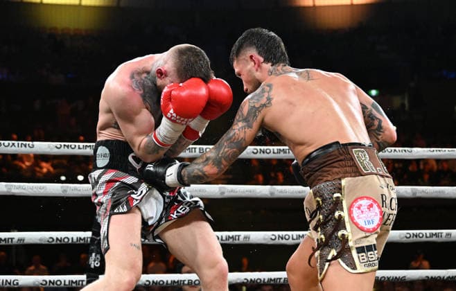BOXING PARO CROCKER, Lewis Crocker (left) of Northern Ireland in action against Liam Paro (right) of Australia during the IBF Welterweight World Title fight at Pat Rafter Arena in Brisbane, Wednesday, June 24, 2026. ( NO ARCHIVING, EDITORIAL USE ONLY BRISBANE QUEENSLAND AUSTRALIA  Copyright: xDARRENxENGLANDx 20260624197420621365