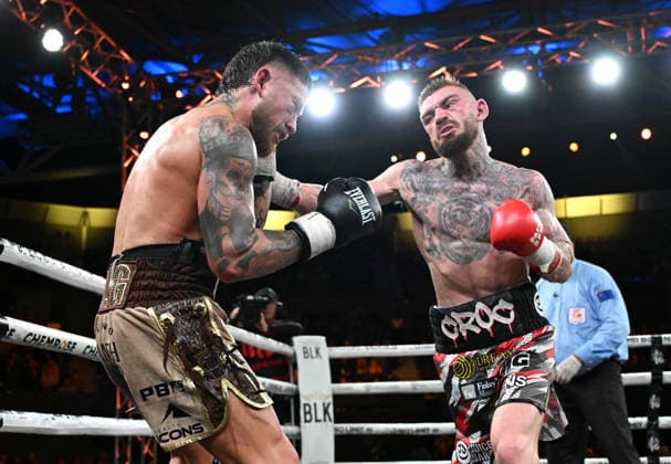 BOXING PARO CROCKER, Liam Paro (left) of Australia in action against Lewis Crocker (right) of Northern Ireland during the IBF Welterweight World Title fight at Pat Rafter Arena in Brisbane, Wednesday, June 24, 2026. ( NO ARCHIVING, EDITORIAL USE ONLY BRISBANE QUEENSLAND AUSTRALIA  Copyright: xDARRENxENGLANDx 20260624186956994520