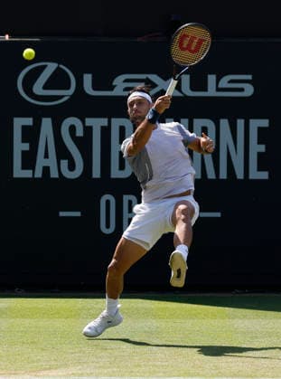 RECORD DATE NOT STATED 24th June 2026; Devonshire Park Lawn Tennis Club, Eastbourne, East Sussex, England; Lexus Eastbourne Open Tennis, Day Four; Thiago Agustin Tirante (ARG) plays a forehand shot against Toby Samuel (GBR) HongboxChen
