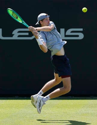 RECORD DATE NOT STATED 24th June 2026; Devonshire Park Lawn Tennis Club, Eastbourne, East Sussex, England; Lexus Eastbourne Open Tennis, Day Four; Toby Samuel (GBR) plays a backhand shot against Thiago Agustin Tirante (ARG) HongboxChen