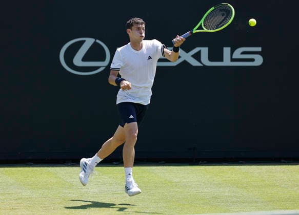 RECORD DATE NOT STATED 24th June 2026; Devonshire Park Lawn Tennis Club, Eastbourne, East Sussex, England; Lexus Eastbourne Open Tennis, Day Four; Juan Manuel Cerundoli (ARG) plays a forehand shot against Arthur Fery (GBR) HongboxChen