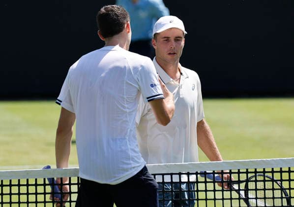 RECORD DATE NOT STATED 24th June 2026; Devonshire Park Lawn Tennis Club, Eastbourne, East Sussex, England; Lexus Eastbourne Open Tennis, Day Four; Arthur Fery (GBR) shakes hands with Juan Manuel Cerundoli (ARG) after the match HongboxChen