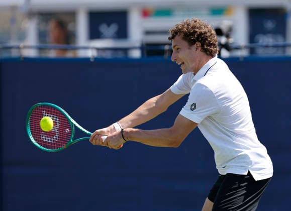 RECORD DATE NOT STATED 24th June 2026; Devonshire Park Lawn Tennis Club, Eastbourne, East Sussex, England; Lexus Eastbourne Open Tennis, Day Four; Ugo Humert (GBR) plays a backhand shot against Jenson Brooksby (USA) HongboxChen