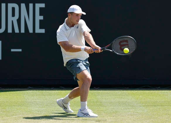 RECORD DATE NOT STATED 24th June 2026; Devonshire Park Lawn Tennis Club, Eastbourne, East Sussex, England; Lexus Eastbourne Open Tennis, Day Four; Arthur Fery (GBR) plays a backhand shot against Juan Manuel Cerundoli (ARG) HongboxChen