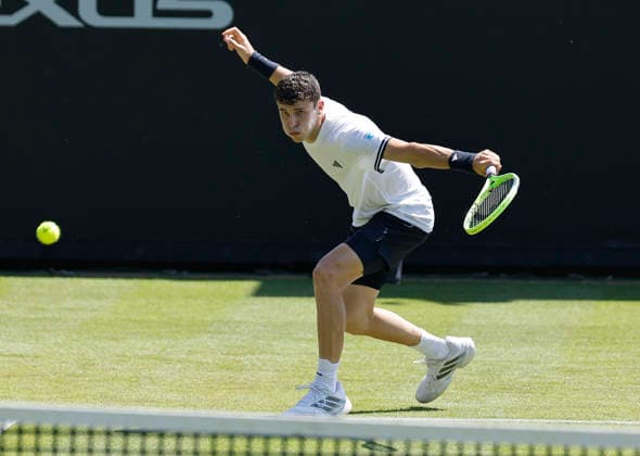 RECORD DATE NOT STATED 24th June 2026; Devonshire Park Lawn Tennis Club, Eastbourne, East Sussex, England; Lexus Eastbourne Open Tennis, Day Four; Juan Manuel Cerundoli (ARG) plays a backhand shot against Arthur Fery (GBR) HongboxChen