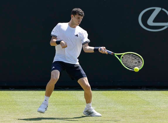 RECORD DATE NOT STATED 24th June 2026; Devonshire Park Lawn Tennis Club, Eastbourne, East Sussex, England; Lexus Eastbourne Open Tennis, Day Four; Juan Manuel Cerundoli (ARG) plays a forehand shot against Arthur Fery (GBR) HongboxChen
