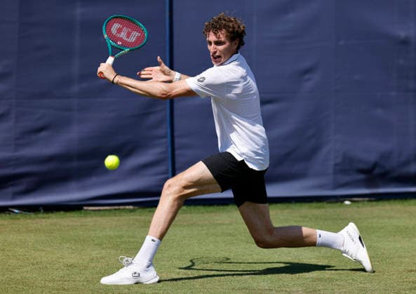 RECORD DATE NOT STATED 24th June 2026; Devonshire Park Lawn Tennis Club, Eastbourne, East Sussex, England; Lexus Eastbourne Open Tennis, Day Four; Ugo Humert (GBR) plays a backhand shot against Jenson Brooksby (USA) HongboxChen