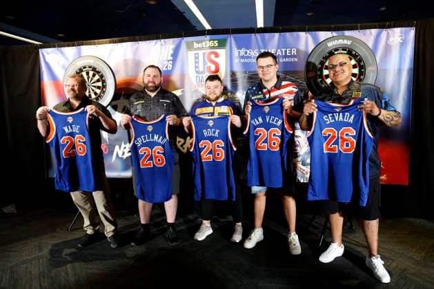 James Wade of England, Alex Spellman, Josh Rock of Northern Ireland, Gian van Veen of Netherlands and Adam Sevada hold New York Knicks jerseys for a photo op on the eve of the bet365 US Darts Masters in The Infosys Theater at Madison Square Garden on Wednesday, June 24, 2026 in New York City.  NYP20260624123 JOHNxANGELILLO