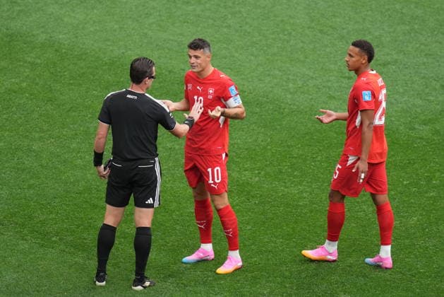 Switzerland v Canada - FIFA World Cup, WM, Weltmeisterschaft, Fussball 2026 - Group B VANCOUVER, CANADA - JUNE 24: Referee Ramon Abatti talks to Granit Xhaka of Switzerland during the 2026 FIFA World Cup Group B match between Switzerland and Canada at BC Place Stadium in Vancouver, Canada, on June 24, 2026. Ercin Erturk Anadolu British Columbia Canada. Editorial use only. Please get in touch for any other usage.  Copyright: x2026xAnadoluxErcinxErturkx