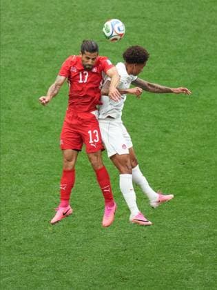 Switzerland v Canada - FIFA World Cup, WM, Weltmeisterschaft, Fussball 2026 - Group B VANCOUVER, CANADA - JUNE 24: Ricardo Rodriguez of Switzerland in action against Jonathan David of Canada during the 2026 FIFA World Cup Group B match between Switzerland and Canada at BC Place Stadium in Vancouver, Canada, on June 24, 2026. Ercin Erturk Anadolu British Columbia Canada. Editorial use only. Please get in touch for any other usage.  Copyright: x2026xAnadoluxErcinxErturkx