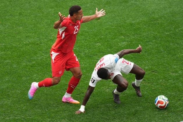 Switzerland v Canada - FIFA World Cup, WM, Weltmeisterschaft, Fussball 2026 - Group B VANCOUVER, CANADA - JUNE 24: Luca Jaquez (L) of Switzerland in action against Richie Laryea of Canada during the 2026 FIFA World Cup Group B match between Switzerland and Canada at BC Place Stadium in Vancouver, Canada, on June 24, 2026. Ercin Erturk Anadolu British Columbia Canada. Editorial use only. Please get in touch for any other usage.  Copyright: x2026xAnadoluxErcinxErturkx