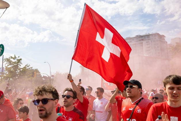 June 24, 2026, Vancouver, Bc, CANADA: Switzerland fans march toward B.C. Place before a World Cup Group B soccer match against Canada, in Vancouver, on Wednesday, June 24, 2026. Canada News - June 24, 2026  - ZUMAc35_ 20260624_zaf_c35_050 Copyright: xTimothyxMatweyx