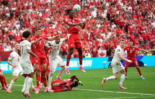 FIFA World Cup, WM, Weltmeisterschaft, Fussball 2026 - Group B - Switzerland vs Canada Johan Manzambi of Switzerland (C) heads the ball during the FIFA World Cup 2026 group stage match Switzerland against Canada, in Vancouver, Canada, 24 June 2026. VANCOUVER Canada  Copyright: xBOBxFRIDx