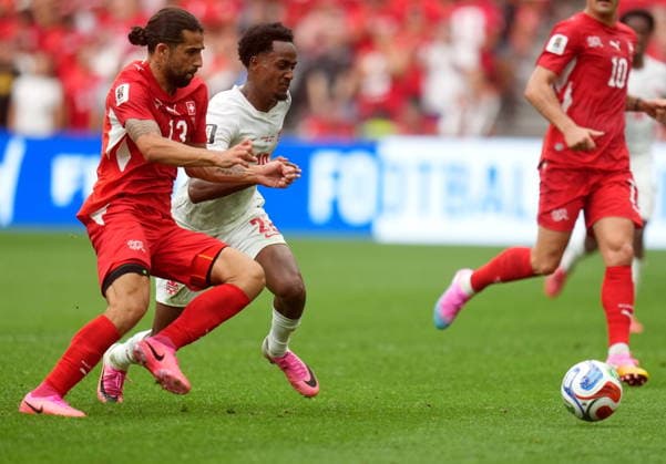 FIFA World Cup, WM, Weltmeisterschaft, Fussball 2026 - Group B - Switzerland vs Canada Ricardo Rodriguez of Switzerland (L) and Ali Ahmed of Canada in action during the FIFA World Cup 2026 group stage match Switzerland against Canada, in Vancouver, Canada, 24 June 2026. VANCOUVER Canada  Copyright: xBOBxFRIDx