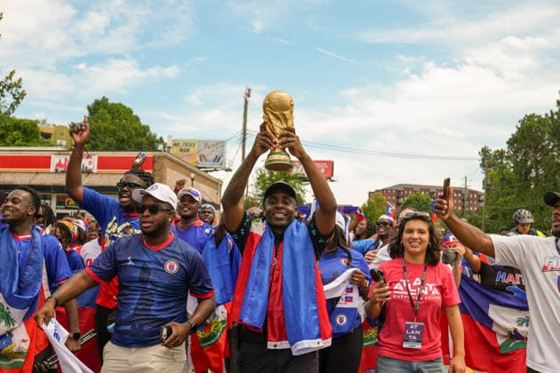 June 24, 2026, Atlanta, Georgia, United States of America: Atlanta Police Officer holds up a replica of the World Cup trophy during the Haiti fan march before the Morocco vs Haiti First Stage Group C match in ATLANTA, Georgia. World Cup 2026: Group C: Morocco : Haiti  - ZUMAg276 20260624_zsp_g276_010 Copyright: xMalachixGabrielx