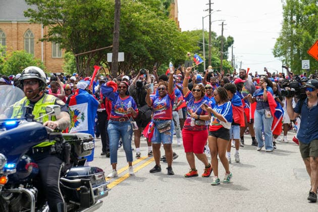 June 24, 2026, Atlanta, Georgia, United States of America: Haiti fans cheering and walking during the Haiti fan march before the Morocco vs Haiti First Stage Group C match in ATLANTA, Georgia. Atlanta United States of America - ZUMAg276 20260624_zsp_g276_023 Copyright: xMalachixGabrielx