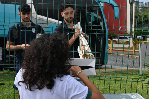 Iranian national team, Nationalteam FIFA World Cup, WM, Weltmeisterschaft, Fussball 2026 leave Mexico camp to Seattle match to face Egypt TIJUANA, MEXICO - JUNE 24: Yalda, a Tijuana-based Iranian citizen, who works as a painter, shows off t-shirts she produced for the Iranian National team before their leave from the Marriott Hotel to the Tijuana International Airport upon the team’s departure for Seattle, Washington, where it will play against Egypt on Friday in Tijuana, Mexico, on Wednesday, June 24, 2026, as part of the 2026 World Cup football tournament. (Carlos A. Moreno for Anadolu Images) Carlos Moreno Anadolu Tijuana Mexico. Editorial use only. Please get in touch for any other usage.  Copyright: x2026xAnadoluxCarlosxMorenox