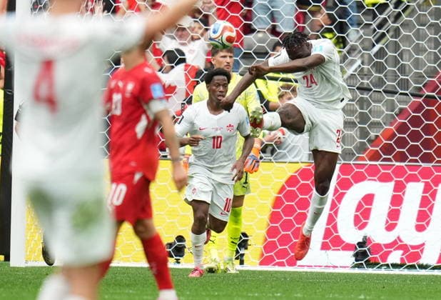 FIFA World Cup, WM, Weltmeisterschaft, Fussball 2026 - Group B - Switzerland vs Canada Promise David of Canada celebrates scoring the 2-1 during the FIFA World Cup 2026 group stage match Switzerland against Canada, in Vancouver, Canada, 24 June 2026. VANCOUVER Canada  Copyright: xBOBxFRIDx